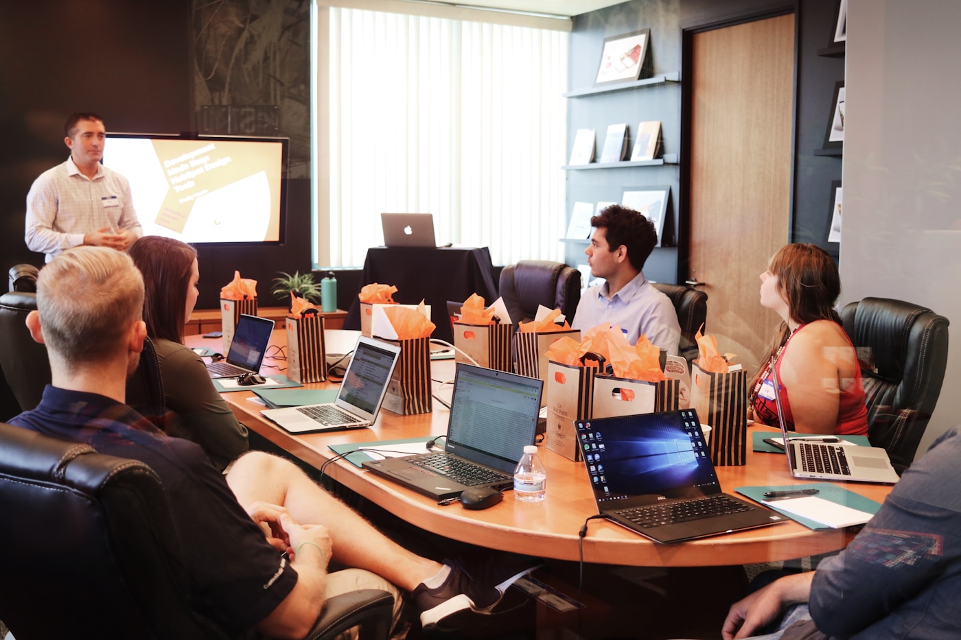 Team reviewing product strategy on a wall